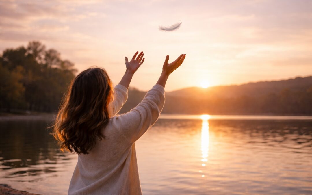 Frau lässt eine Feder in den Himmel steigen – Sinnbild dafür, dass Loslassen kein Tun, sondern ein Nicht-Tun ist.